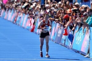 female participant running in the full marathon in Bhutan Coronation Marathon 2024